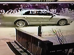 Victims snapped this photo of getaway vehicle as armed robbery suspects sped off.