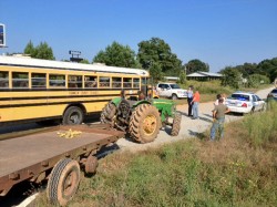 tractor vs school bus