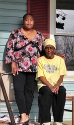 Diane and May Brown celebrate the mortgage burning of their Habitat Home