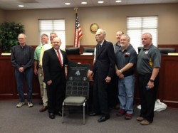 Phillips stands with Royston Mayor David Jordan and City Council during award presentation Tuesday night.
