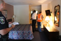 City and County inspectors check a room at the Toccoa Inn